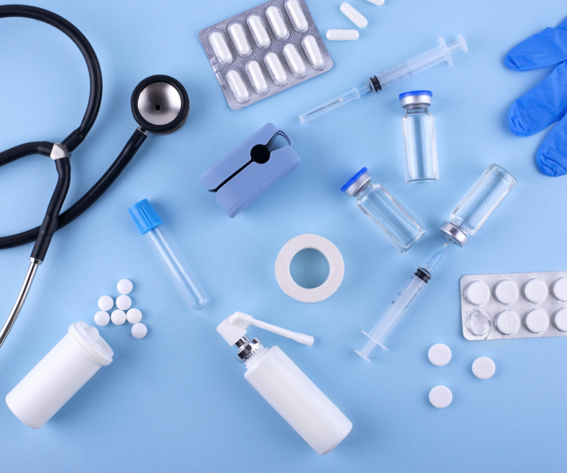 top-view-pills-stethoscope-arrangement